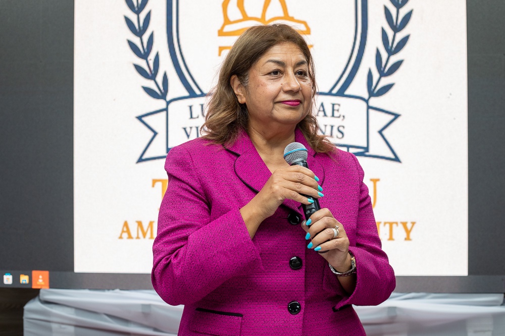 Founder of Timbuktu American University speaking at an event